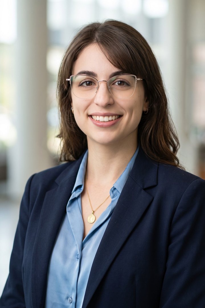 Lena Marchetti, principal of Ondine Solutions, in a navy blazer and glasses